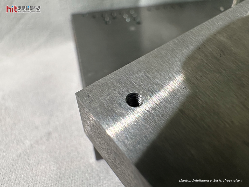 HIT ultrasonic-assisted machining of tungsten carbide M2 internal threading workpiece